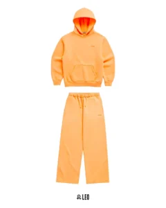 Front view of Madhappy Orange Tracksuit by madhappy it’s a pair of hoodie and sweatpent.